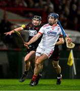 3 November 2024; Chris Thomas of Doon is tackled by Pauric Mahony of Ballygunner during the AIB Munster GAA Senior Club Hurling Championship quarter-final match between Doon and Ballygunner at TUS Gaelic Grounds in Limerick. Photo by Brendan Moran/Sportsfile