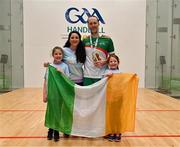 3 November 2024; Joe McCann of Team Ireland with his wife Niamh and daughters Róisín, age 8, left, and Clodagh, age 7, after his victory in the Men's Open doubles final during day nine of the O'Neills.com World 4-Wall Championships at Croke Park in Dublin. Photo by Stephen Marken/Sportsfile
