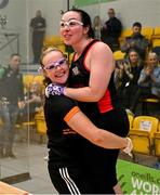 3 November 2024; Martina McMahon of Broadford, Limerick, lifts doubles partner Aoife McCarthy of Mullingar, Westmeath, after their victory in the Open Ladies doubles final  during day nine of the O'Neills.com World 4-Wall Championships at Croke Park in Dublin. Photo by Stephen Marken/Sportsfile