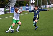 4 November 2024; Billy Canny of Republic of Ireland in action against Cameron Williams of Scotland during the UEFA U17 European Championships Round 1 qualifier match between Scotland and Republic of Ireland at Inver Park in Larne, Antrim. Photo by Ben McShane/Sportsfile