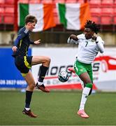 4 November 2024; Jaden Umeh of Republic of Ireland in action against Alfie Osbourne of Scotland during the UEFA U17 European Championships Round 1 qualifier match between Scotland and Republic of Ireland at Inver Park in Larne, Antrim. Photo by Ben McShane/Sportsfile
