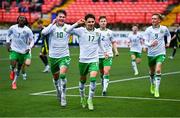 4 November 2024; Ramon Martos of Republic of Ireland, centre, celebrates with teammates, including Grady McDonnell, left, after scoring their side's first goal during the UEFA U17 European Championships Round 1 qualifier match between Scotland and Republic of Ireland at Inver Park in Larne, Antrim. Photo by Ben McShane/Sportsfile