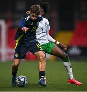 4 November 2024; Euan Glasgow of Scotland in action against Jaden Umeh of Republic of Ireland during the UEFA U17 European Championships Round 1 qualifier match between Scotland and Republic of Ireland at Inver Park in Larne, Antrim. Photo by Ben McShane/Sportsfile
