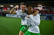 4 November 2024; Oisin McDonagh, left, and Goodness Ogbonna of Republic of Ireland celebrate after their side qualify for the next round after the UEFA U17 European Championships Round 1 qualifier match between Scotland and Republic of Ireland at Inver Park in Larne, Antrim. Photo by Ben McShane/Sportsfile