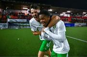 4 November 2024; Oisin McDonagh, left, and Goodness Ogbonna of Republic of Ireland celebrate after their side qualify for the next round after the UEFA U17 European Championships Round 1 qualifier match between Scotland and Republic of Ireland at Inver Park in Larne, Antrim. Photo by Ben McShane/Sportsfile