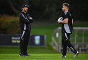 7 November 2024; Head of performace Nic Gill, left, and Sam Cane during a New Zealand Rugby captain's run at the UCD Bowl in Dublin. Photo by Seb Daly/Sportsfile