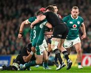 8 November 2024; Jordie Barrett of New Zealand tackles Garry Ringrose of Ireland subsequently leading to him receiving a yellow card during the Autumn Nations Series match between Ireland and New Zealand at the Aviva Stadium in Dublin. Photo by Brendan Moran/Sportsfile