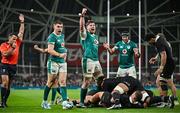 8 November 2024; Ireland players, from left, Garry Ringrose, Joe McCarthy and Caelan Doris celebrate their side's first try scored by team-mate Josh van der Flier during the Autumn Nations Series match between Ireland and New Zealand at the Aviva Stadium in Dublin. Photo by Sam Barnes/Sportsfile