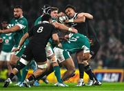 8 November 2024; Rieko Ioane of New Zealand is dispossessed by Jack Crowley of Ireland during the Autumn Nations Series match between Ireland and New Zealand at the Aviva Stadium in Dublin. Photo by Brendan Moran/Sportsfile