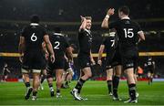 8 November 2024; Will Jordan of New Zealand, right, is congratulated by team-mate Damian McKenzie after scoring his side's first try during the Autumn Nations Series match between Ireland and New Zealand at the Aviva Stadium in Dublin. Photo by Seb Daly/Sportsfile