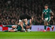 8 November 2024; Ronan Kelleher of Ireland in action against Damian McKenzie of New Zealand during the Autumn Nations Series match between Ireland and New Zealand at the Aviva Stadium in Dublin. Photo by Seb Daly/Sportsfile