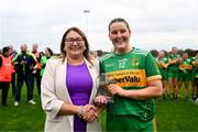 9 November 2024; Sarah Lavin of Kilcock receives the Player of the Match award from Trina Murray, Leinster LGFA President, following the 2024 AIB Leinster LGFA Junior Club Championship final between Baile Dubh Tíre and Kilcock at Coralstown/Kinnegad GAA in Westmeath. Photo by Tyler Miller/Sportsfile