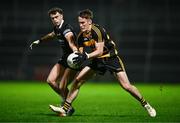 9 November 2024; Brandon Boylan of Crosserlough is tackled by Shealan Johnston of Kilcoo during the AIB Ulster GAA Senior Club Football Championship quarter-final match between Kilcoo and Crosserlough at Páirc Esler in Newry, Down. Photo by Ben McShane/Sportsfile