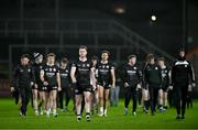 9 November 2024; Kilcoo players, lead by Stephen Kane, centre, leave the pitch after their victory in the AIB Ulster GAA Senior Club Football Championship quarter-final match between Kilcoo and Crosserlough at Páirc Esler in Newry, Down. Photo by Ben McShane/Sportsfile