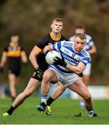 10 November 2024; Brian Hurley of Castlehaven in action against Mark O'Shea of Dr Crokes during the AIB Munster GAA Senior Club Football Championship quarter-final match between Dr Crokes and Castlehaven at Lewis Road in Killarney, Kerry. Photo by Michael P Ryan/Sportsfile