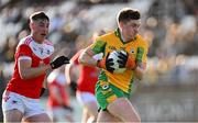 10 November 2024; Brian Cogger of Corofin in action against Caelim Keogh of Pádraig Pearses during the AIB Connacht GAA Senior Club Football Championship quarter-final match between Corofin and Pádraig Pearses at Tuam Stadium in Tuam, Galway. Photo by Piaras Ó Mídheach/Sportsfile