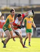 10 November 2024; Eoin Colleran of Pádraig Pearses is tackled by Liam Silke of Corofin during the AIB Connacht GAA Senior Club Football Championship quarter-final match between Corofin and Pádraig Pearses at Tuam Stadium in Tuam, Galway. Photo by Piaras Ó Mídheach/Sportsfile