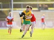 10 November 2024; Patrick Egan of Corofin is tackled by Conor Harley of Pádraig Pearses during the AIB Connacht GAA Senior Club Football Championship quarter-final match between Corofin and Pádraig Pearses at Tuam Stadium in Tuam, Galway. Photo by Piaras Ó Mídheach/Sportsfile