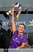 10 November 2024; The Kilmacud Crokes captain Emer Sweeney lifts the cup after the 2024 AIB Leinster LGFA Senior Club Final between Eadestown and Kilmacud Crokes at Glenisk O’Connor Park in Tullamore, Offaly. Photo by Ray McManus/Sportsfile