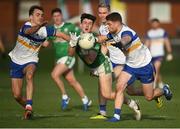 10 November 2024; Conhuir Johnson of Cargin in action against Darragh Canavan and Niall Kelly of Errigal Ciarán during the AIB Ulster GAA Senior Club Football Championship quarter-final match between Cargin and Errigal Ciarán at Corrigan Park in Belfast. Photo by Philip Fitzpatrick/Sportsfile