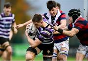 10 November 2024; David Walsh of Terenure is tackled by Johnny Cahalan of Clontarf during the Bank of Ireland JP Fanagan Premier League 1 match between Terenure and Clontarf at Lakelands Park in Dublin. Photo by David Fitzgerald/Sportsfile