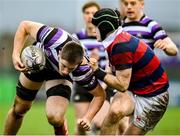 10 November 2024; David Walsh of Terenure is tackled by Johnny Cahalan of Clontarf during the Bank of Ireland JP Fanagan Premier League 1 match between Terenure and Clontarf at Lakelands Park in Dublin. Photo by David Fitzgerald/Sportsfile