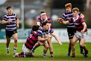 10 November 2024; Eddie Bohan of Terenure is tackled by Ruairi Munnelly of Clontarf during the Bank of Ireland JP Fanagan Premier League 1 match between Terenure and Clontarf at Lakelands Park in Dublin. Photo by David Fitzgerald/Sportsfile