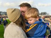 10 November 2024; Alan Cormican of Loughrea celebrates with his wife Aisling, and son Ryan, age 2, after his side's victory in the Galway County Senior Club Hurling Championship final match between Cappataggle and Loughrea at Kenny Park in Athenry, Galway. Photo by Tom Beary/Sportsfile