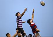 10 November 2024; Mark McDermott of Terenure in action against Ruairi Munnelly of Clontarf during the Bank of Ireland JP Fanagan Premier League 1 match between Terenure and Clontarf at Lakelands Park in Dublin. Photo by David Fitzgerald/Sportsfile