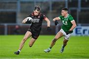 10 November 2024; Barry McCambridge of Clann Éireann in action against Conor Doherty of Newbridge during the AIB Ulster GAA Senior Club Football Championship quarter-final match between Sean O'Leary GAC Newbridge and Clann Éireann at Celtic Park in Derry. Photo by Oliver McVeigh/Sportsfile