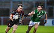 10 November 2024; Barry McCambridge of Clann Éireann in action against Conor Doherty of Newbridge during the AIB Ulster GAA Senior Club Football Championship quarter-final match between Sean O'Leary GAC Newbridge and Clann Éireann at Celtic Park in Derry. Photo by Oliver McVeigh/Sportsfile