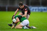 10 November 2024; Conor Doherty of Newbridge in action against Barry McCambridge of Clann Éireann during the AIB Ulster GAA Senior Club Football Championship quarter-final match between Sean O'Leary GAC Newbridge and Clann Éireann at Celtic Park in Derry. Photo by Oliver McVeigh/Sportsfile