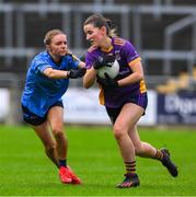 10 November 2024; Aoife Kane of Kilmacud Crokes in action against Tara Bedford of Eadestown during the 2024 AIB Leinster LGFA Senior Club Final between Eadestown and Kilmacud Crokes at Glenisk O’Connor Park in Tullamore, Offaly. Photo by Ray McManus/Sportsfile