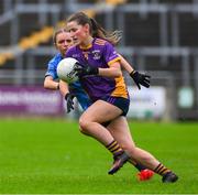 10 November 2024; Aoife Kane of Kilmacud Crokes in action against Tara Bedford of Eadestown during the 2024 AIB Leinster LGFA Senior Club Final between Eadestown and Kilmacud Crokes at Glenisk O’Connor Park in Tullamore, Offaly. Photo by Ray McManus/Sportsfile