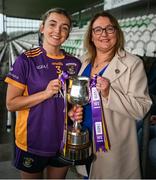 10 November 2024; Trina Murray, Leinster LGFA President, presents the cup to Emer Sweeney of Kilmacud Crokes after the 2024 AIB Leinster LGFA Senior Club Final between Eadestown and Kilmacud Crokes at Glenisk O’Connor Park in Tullamore, Offaly. Photo by Ray McManus/Sportsfile