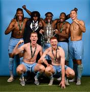 10 November 2024; Drogheda United players, back row, from left, Aaron Harper Bailey, Zishim Bawa, Frantz Pierrot, Elicha Ahui and Douglas James-Taylor, with Jack Keaney, left, and James Bolger pose for a photograph with the FAI Cup after the Sports Direct Men's FAI Cup Final match between Drogheda United and Derry City at the Aviva Stadium in Dublin. Photo by Stephen McCarthy/Sportsfile