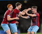 10 November 2024; Drogheda United players, from left, James Bolger, Andrew Quinn and Aaron McNally celebrate after the Sports Direct Men's FAI Cup Final match between Drogheda United and Derry City at the Aviva Stadium in Dublin. Photo by Stephen McCarthy/Sportsfile