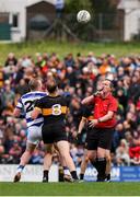 10 November 2024; Referee Sean Lonergan throws the ball up between Conor Cahalane of Castlehaven and Mark O'Shea of Dr Crokes during the AIB Munster GAA Senior Club Football Championship quarter-final match between Dr Crokes and Castlehaven at Lewis Road in Killarney, Kerry. Photo by Michael P Ryan/Sportsfile