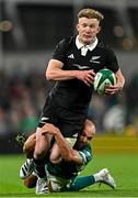 8 November 2024; Damian McKenzie of New Zealand in action against Jamison Gibson-Park of Ireland during the Autumn Nations Series match between Ireland and New Zealand at the Aviva Stadium in Dublin. Photo by Sam Barnes/Sportsfile