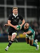 8 November 2024; Damian McKenzie of New Zealand in action against Jamison Gibson-Park of Ireland during the Autumn Nations Series match between Ireland and New Zealand at the Aviva Stadium in Dublin. Photo by Sam Barnes/Sportsfile
