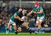 8 November 2024; Will Jordan of New Zealand, is tackled by Jamison Gibson-Park, left, and Josh van der Flier of Ireland during the Autumn Nations Series match between Ireland and New Zealand at the Aviva Stadium in Dublin. Photo by Sam Barnes/Sportsfile
