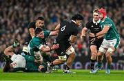 8 November 2024; Wallace Sititi of New Zealand in action against Ireland players, from left, Finlay Bealham, Joe McCarthy and Josh van der Flier  during the Autumn Nations Series match between Ireland and New Zealand at the Aviva Stadium in Dublin. Photo by Sam Barnes/Sportsfile