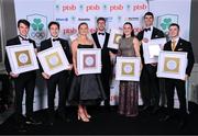9 November 2024; The Paris 2024 Medallists were the winners of the PTSB Inspiring a Nation Award 2024 which was presented by Eamonn Crowley, CEO of PTSB, title sponsors to Team Ireland. Pictured are, from left, Rowing gold medallists Fintan McCarthy and Paul O’Donovan, Swimming bronze medallist Mona McSharry, Swimming gold and bronze medallist Daniel Wiffen, Boxing gold medallist Kellie Harrington, Gymnastics gold medallist Rhys McClenaghan and Rowing bronze medallist Philip Doyle. Absent from the event is Rowing bronze medallist Daire Lynch. Photo by Brendan Moran/Sportsfile