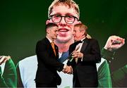 9 November 2024; The Paris 2024 Medallists were the winners of the PTSB Inspiring a Nation Award 2024 which was presented by Eamonn Crowley, CEO of PTSB, title sponsors to Team Ireland. Pictured is Gymnastics gold medallist Rhys McClenaghan being presented with his award by PTSB CEO Eamonn Crowley.