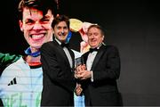 9 November 2024; The Paris 2024 Medallists were the winners of the PTSB Inspiring a Nation Award 2024 which was presented by Eamonn Crowley, CEO of PTSB, title sponsors to Team Ireland. Pictured is Rowing gold medallists Paul O’Donovan being presemted with his award by PTSB CEO Eamonn Crowley.