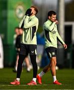 12 November 2024; Kasey McAteer, left, and Jason Molumby react during a Republic of Ireland training session at the FAI National Training Centre in Abbotstown, Dublin. Photo by Ben McShane/Sportsfile