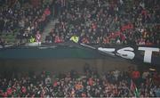 10 November 2024; Satdium stewards remove a banner from the South Stand hung by Derry City supporters during the Sports Direct Men's FAI Cup Final match between Drogheda United and Derry City at the Aviva Stadium in Dublin. Photo by Stephen McCarthy/Sportsfile