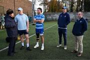 12 November 2024; Dan Sheehan, Will Connors and head coach Leo Cullen meet Clongowes Wood College director Michael Shield, left, and director of sport Johnny O'Donoghue  before a field session as part of the Leinster Rugby 12 County Tour in Clongowes Wood College in Clane, Kildare. Photo by Brendan Moran/Sportsfile