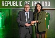 14 November 2024; Chloe Kenna is presented with the Football For All Player of the Year award by FAI President Paul Cooke during the 34th FAI International Awards at the Aviva Stadium in Dublin. Photo by Ben McShane/Sportsfile