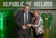 14 November 2024; Nora McHugh is presented with a Hall of Fame award by FAI President Paul Cooke during the 34th FAI International Awards at the Aviva Stadium. Photo by Ben McShane/Sportsfile